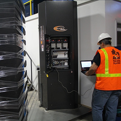 service man next to machine